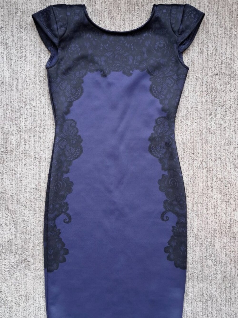 Khloe Kardashian cutout shoulder dress